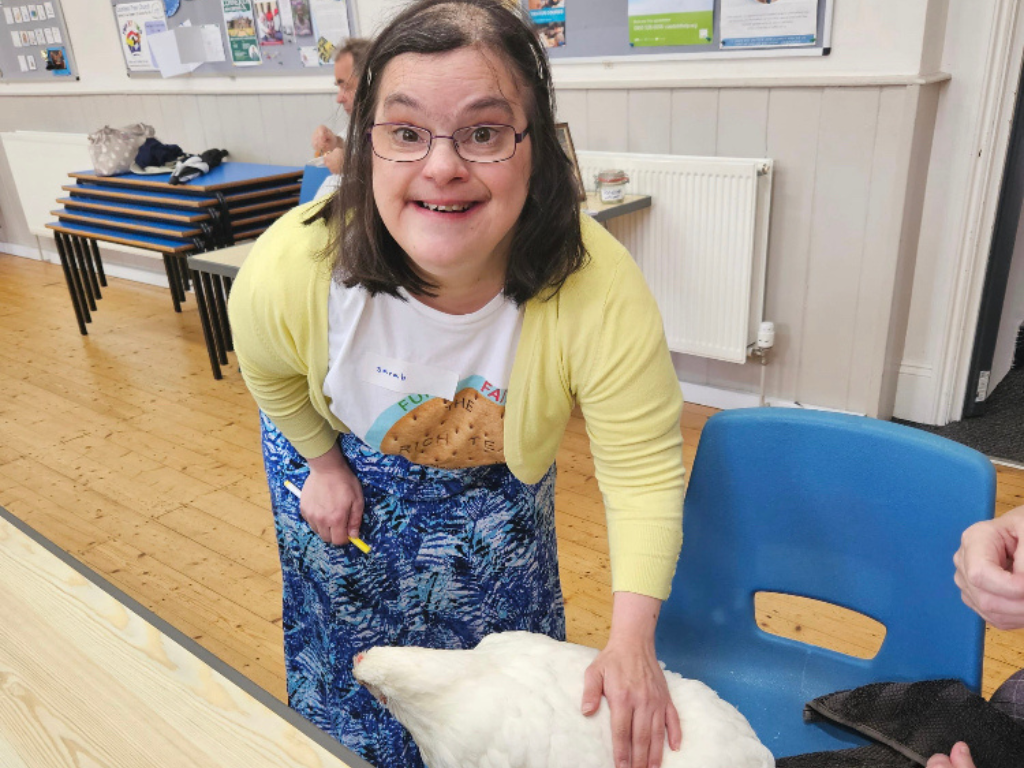 In the quiet act of petting a hen, a member of our fellowship explores their connection with God's creation, finding solace and meaning in the natural world.